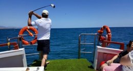 golf at sea from a boat in marbs